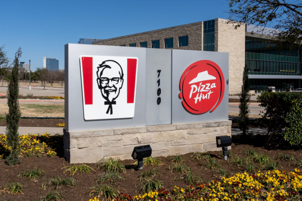 KFC and Pizza Hut logos on a sign