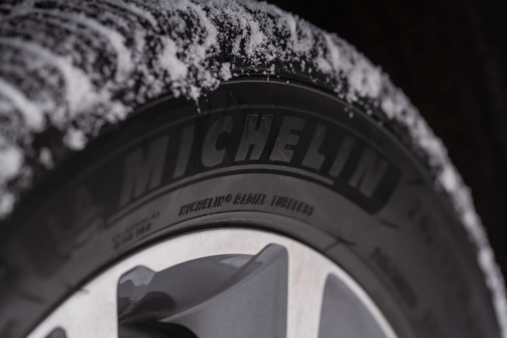 Close up shot of Michelin Tires with snow on them