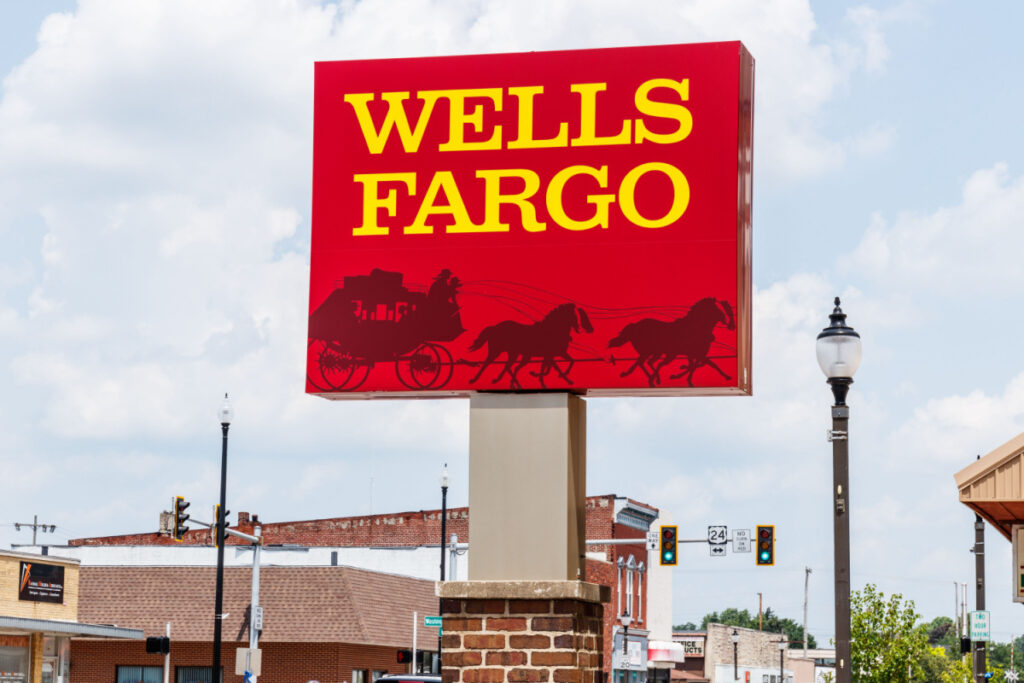Wells Fargo sign with stage coach outside branch
