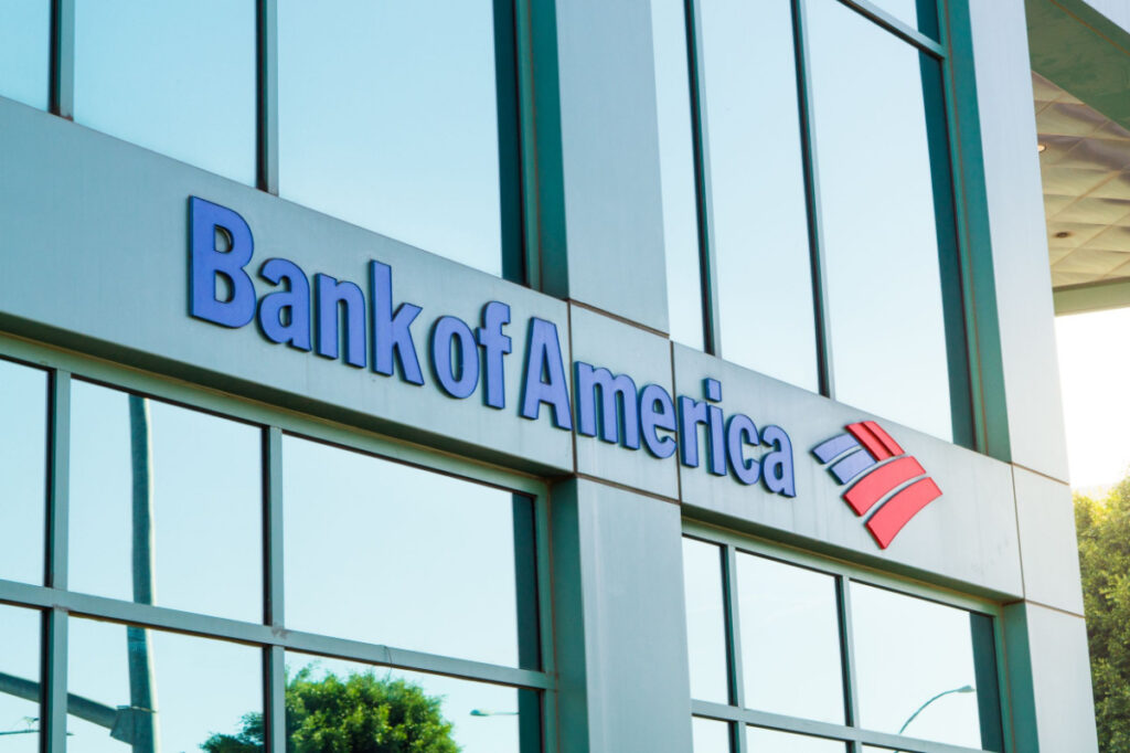Bank of American sign outside glass building