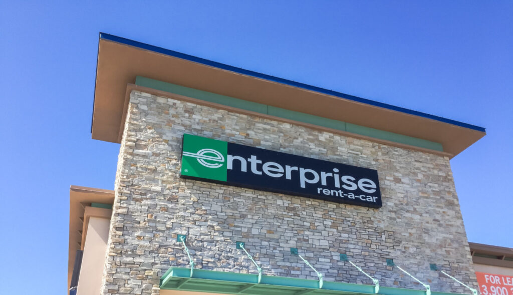 Enterprise car rental building on sunny day representing the Enterprise employee biometric privacy settlement.