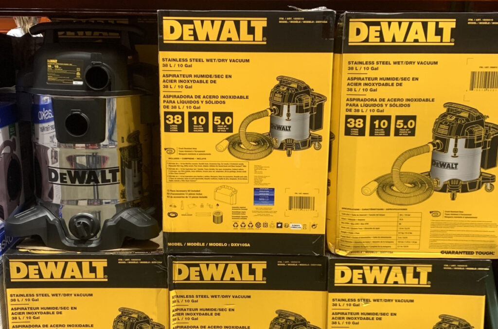 Dewalt shop vac vacuum cleaners on an open wooden shipping palette