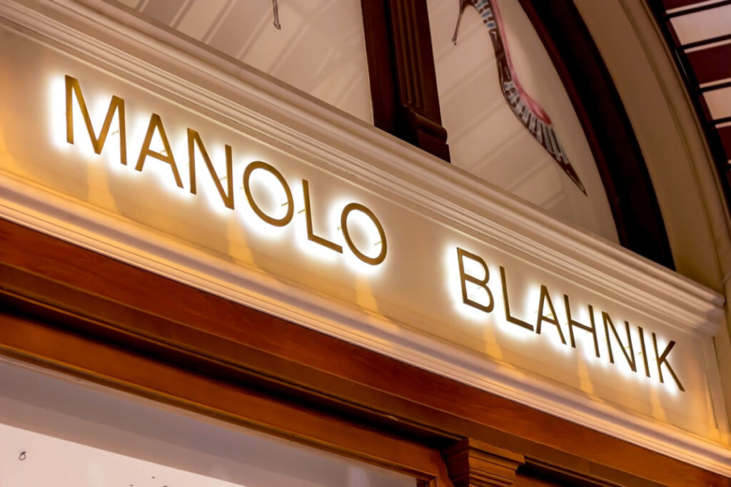 Manolo Blahnik brand retail shop logo signboard on the storefront in the shopping mall