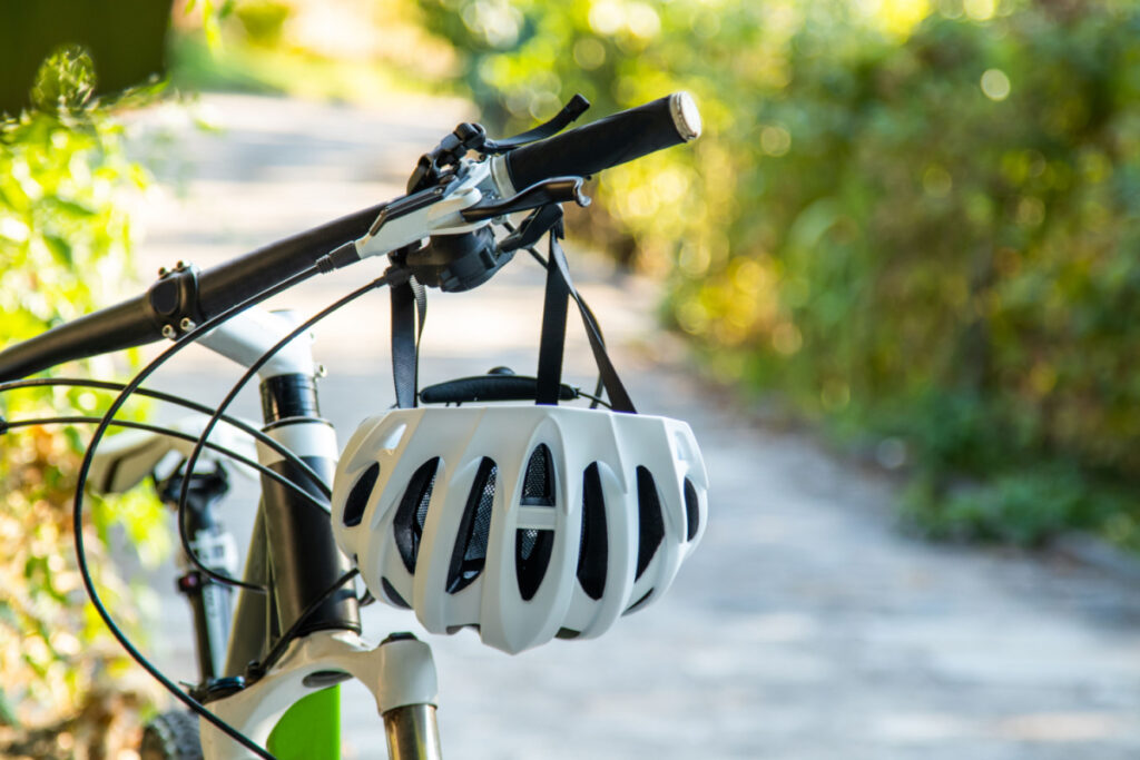 mountain bike with helmet on handlebars