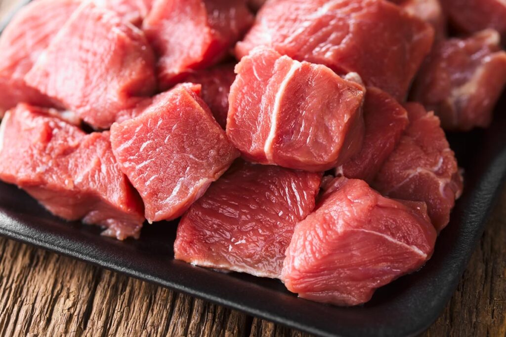 Close up of diced raw beef, representing the JBS settlement.