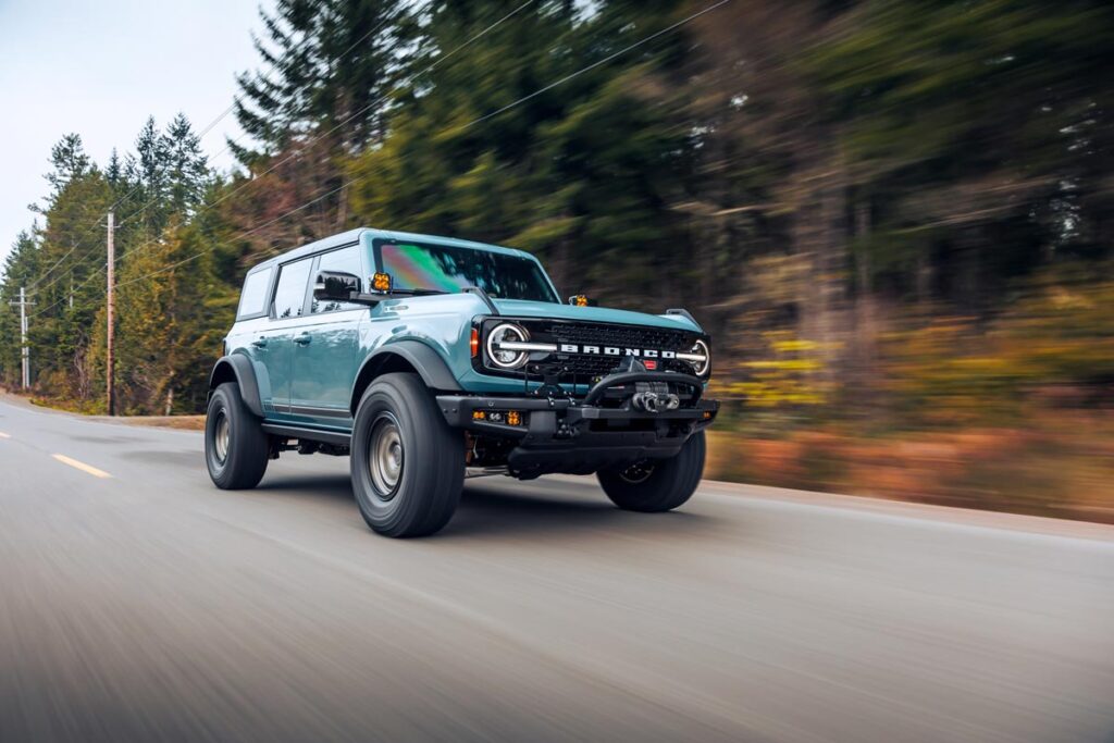 A 2022 Ford Bronco driving on a road, representing the Ford Bronco recall.