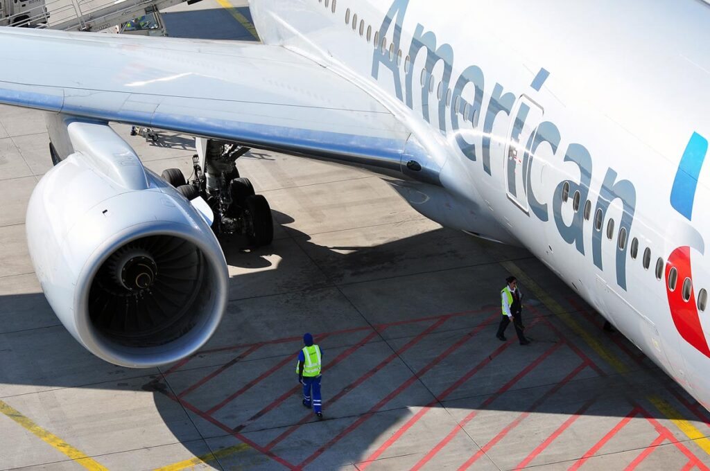 Close up of American Airlines logo on the side plane, representing the proposed Jet Blue and American Airlines merger.