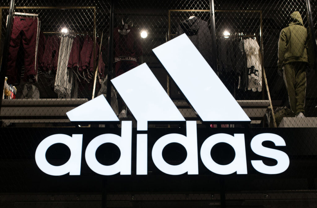 Close up of Adidas signage, representing the Adidas Missouri tax class action lawsuit settlement.