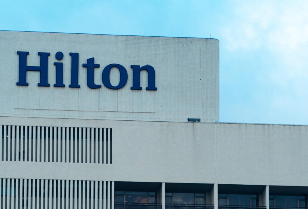 Close up of Hilton signage, representing the Texas Hilton hidden resort fees lawsuit.