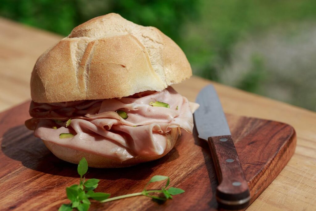 Close up of a Mortadella sandwich, representing the mortadella deli meat recall.