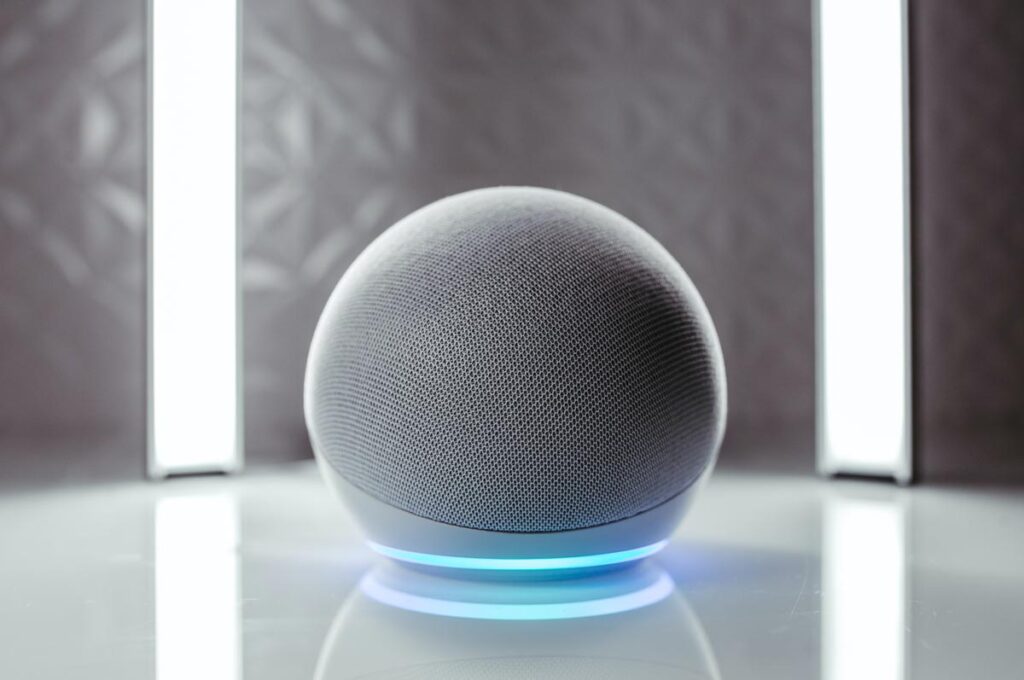 Close up of an Amazon voice assistant speaker, representing the Amazon Ring and Alexa settlements.