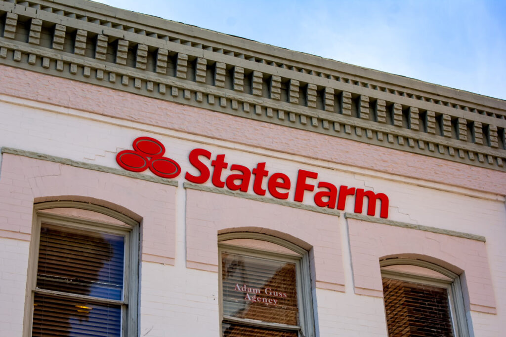 State Farm signage on a building,representing the State Farm class action lawsuit settlement.