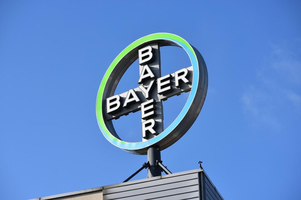 Close up of Bayer signage against a blue sky, representing the Bayer class action.