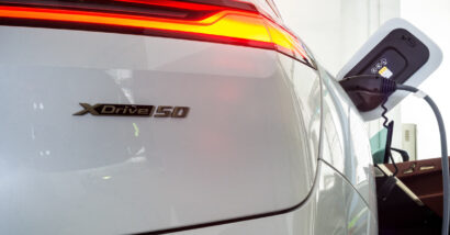 Close up of bumper of white BMW xDrive50, representing the BMW cruise control recall.