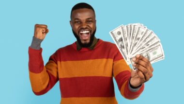 Joyful Man Holding Dolar Cash In Hands