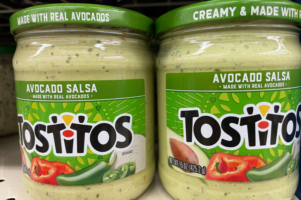 Tostitos Avocado sauce on a grocery store shelf, representing the Frito-Lay salsa recall.