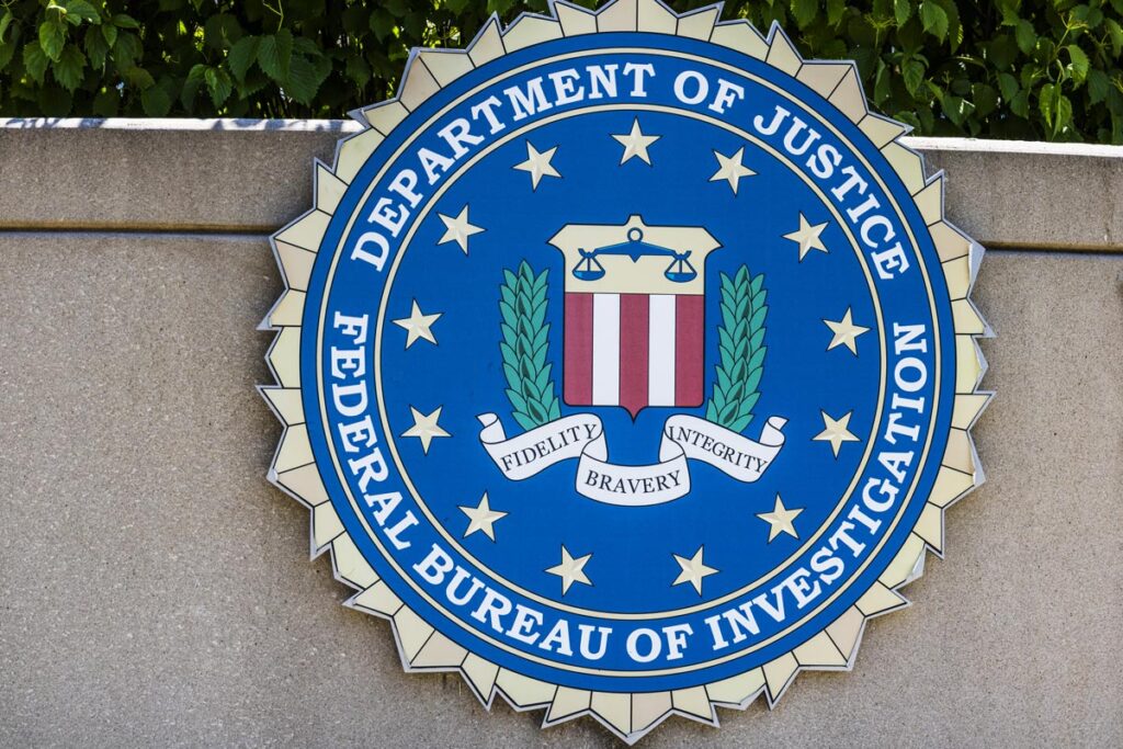 Close up of FBI signage, representing the federal warning of an ongoing file transfer hacking campaign.
