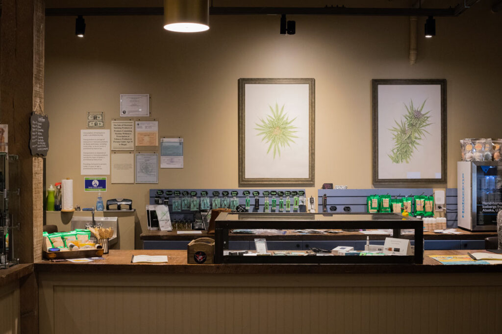 Interior of a dispensary, representing the Curaleaf CBD drops THC false advertising class action lawsuit settlement.