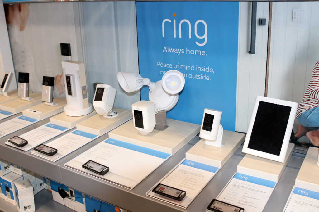 Amazon Ring products displayed in a store, representing the Amazon trademark infringement lawsuit.