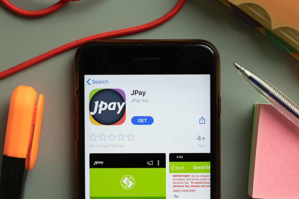 Jpay app download page displayed on a smartphone screen, representing the JPay tablets class action.