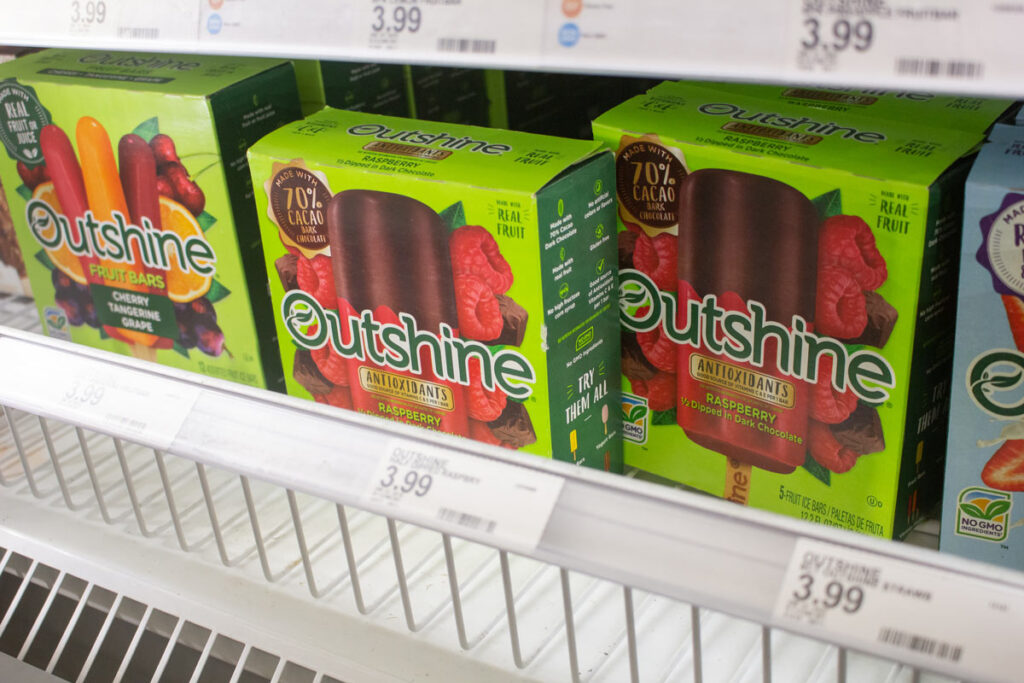 Outshine Fruit Bars for sale in a grocery store freezer, representing the Outshine allergy recall.