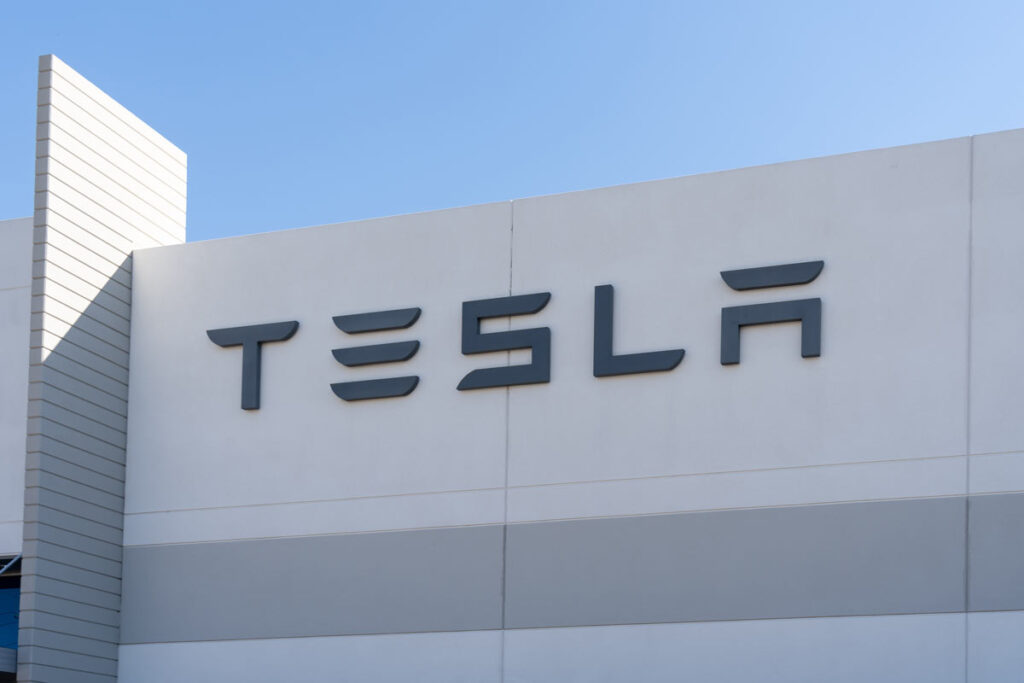 Close up of Tesla signage, representing the Tesla settlement.