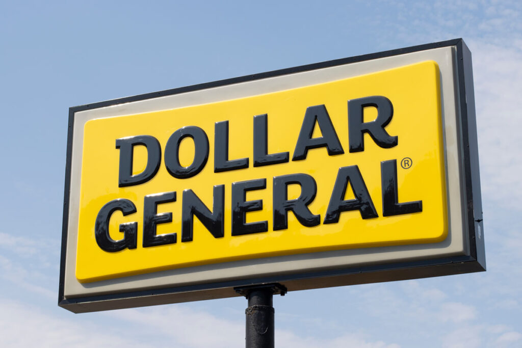 Close up of Dollar General signage against a blue sky, representing the Dollar General class action.