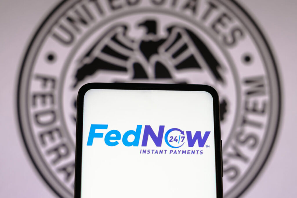 Close up of FedNow logo displayed on smartphone screen, representing FedNow instant payment.