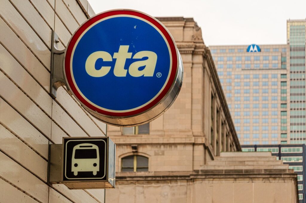 A CTA sign is seen on a building, representing the CTA settlement.