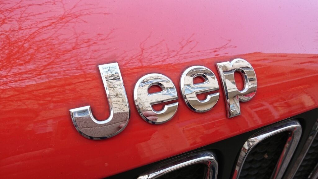 Jeep logo on red Cherokee