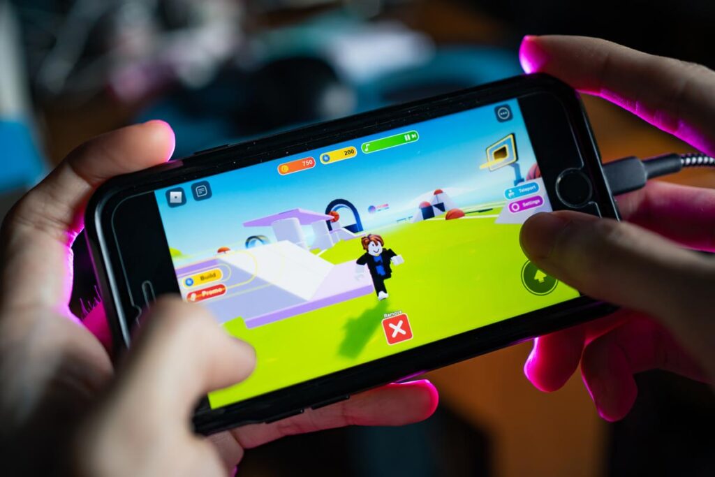 Close up of Roblox game displayed on a smartphone screen, representing the Roblox class action.