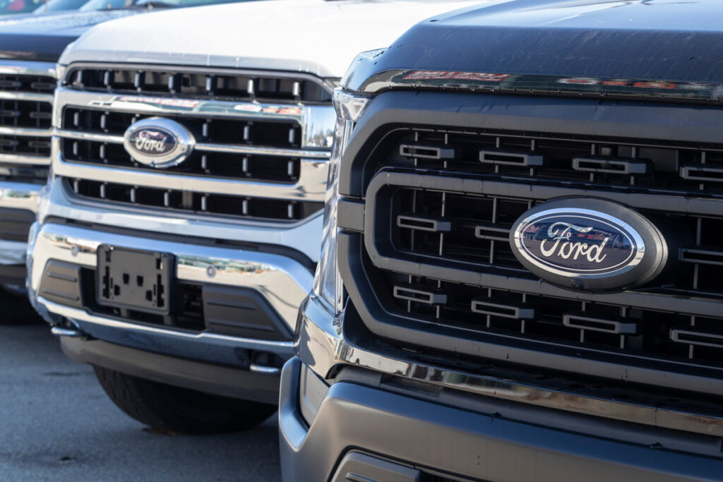 Front bumper of two Ford trucks, representing the Ford F-150 recall.