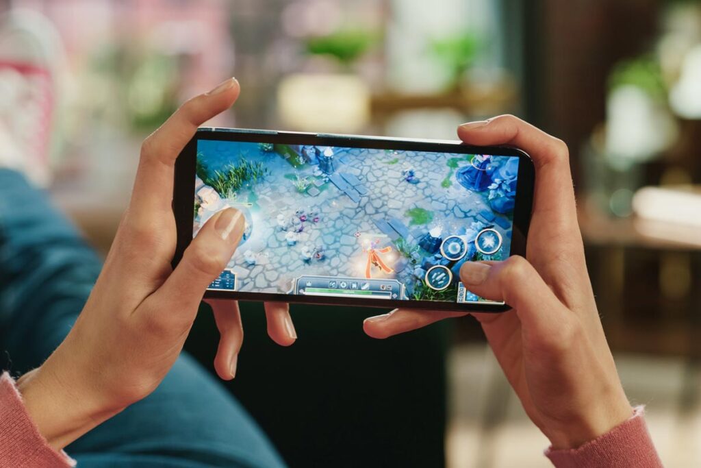Close up of a game shown on a smartphone screen, representing the Guns of Glory class action.