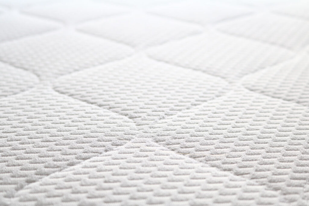 Close up of mattress texture, representing the DreamCloud Mattress Federal Trade Commission  (FTC) settlement.
