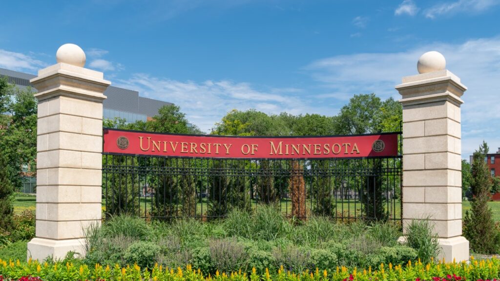 Entrance sign and garden near Stadium Village on the east bank of the University of Minnesota.
