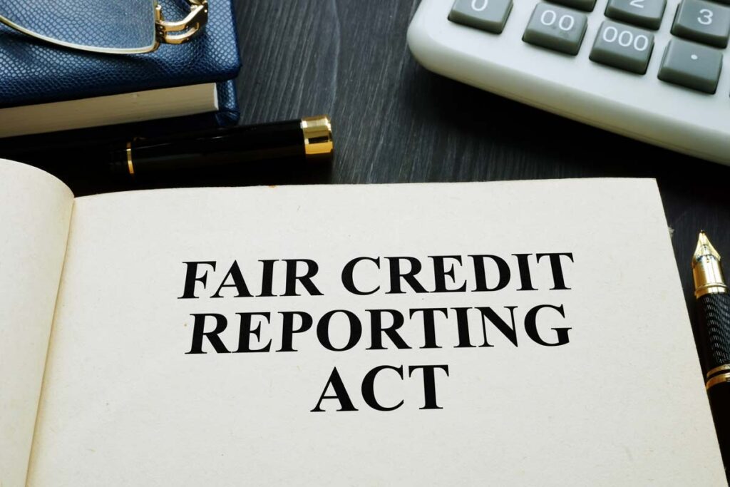 Fair credit reporting act text displayed in a book, representing the Waste Pro USA FCRA settlement.