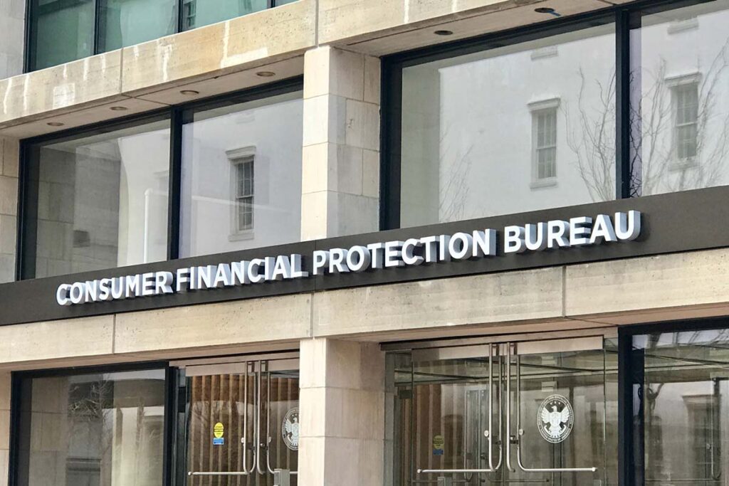 Consumer Financial Protection Bureau entrance, representing the Consumer Financial Protection Bureau discrimination settlement.