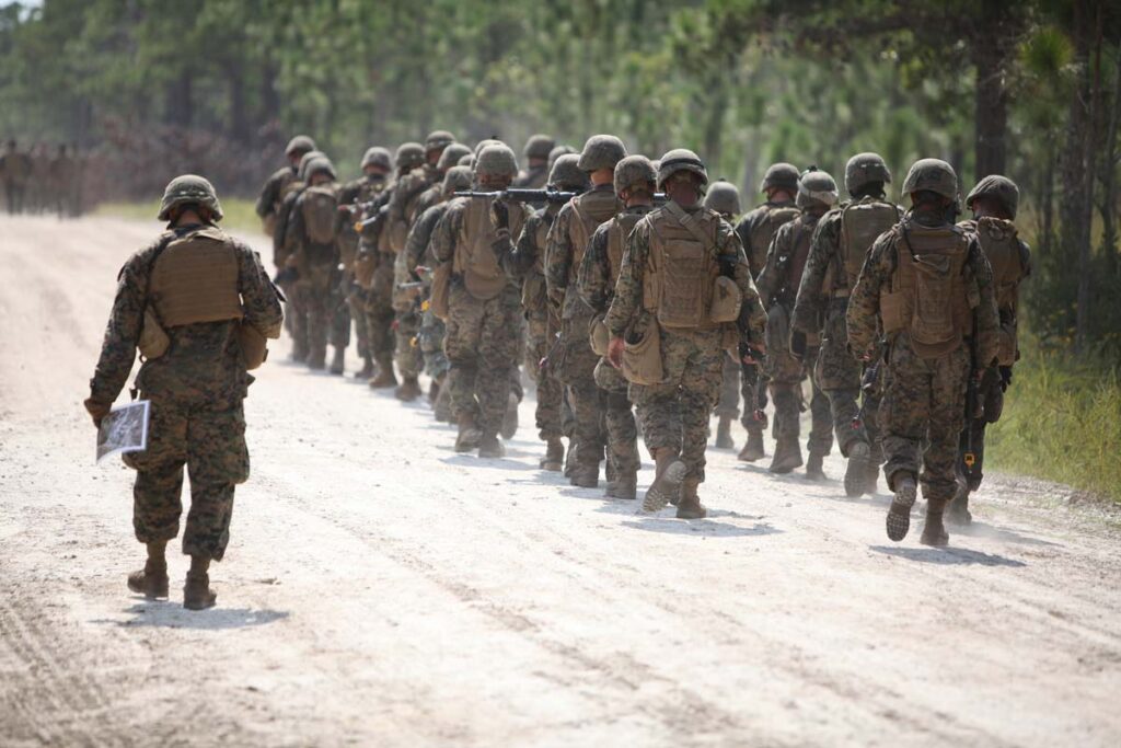 US Marines walking in a group at Camp Lejeune, representing the Camp Lejeune tainted water claims.