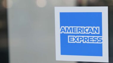 Close up of an American Express sticker on a window, representing the American Express hard credit class action.