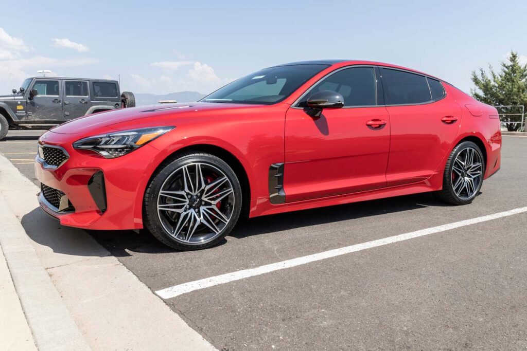 Exterior of a red Kia Stinger, representing the Kia Stinger valve plunger defect recall.