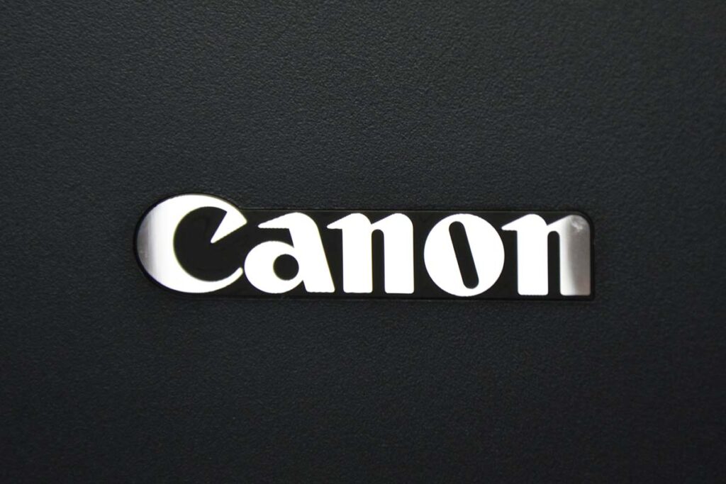 Close up of the Canon logo, representing the Canon all-in-one printers class action.