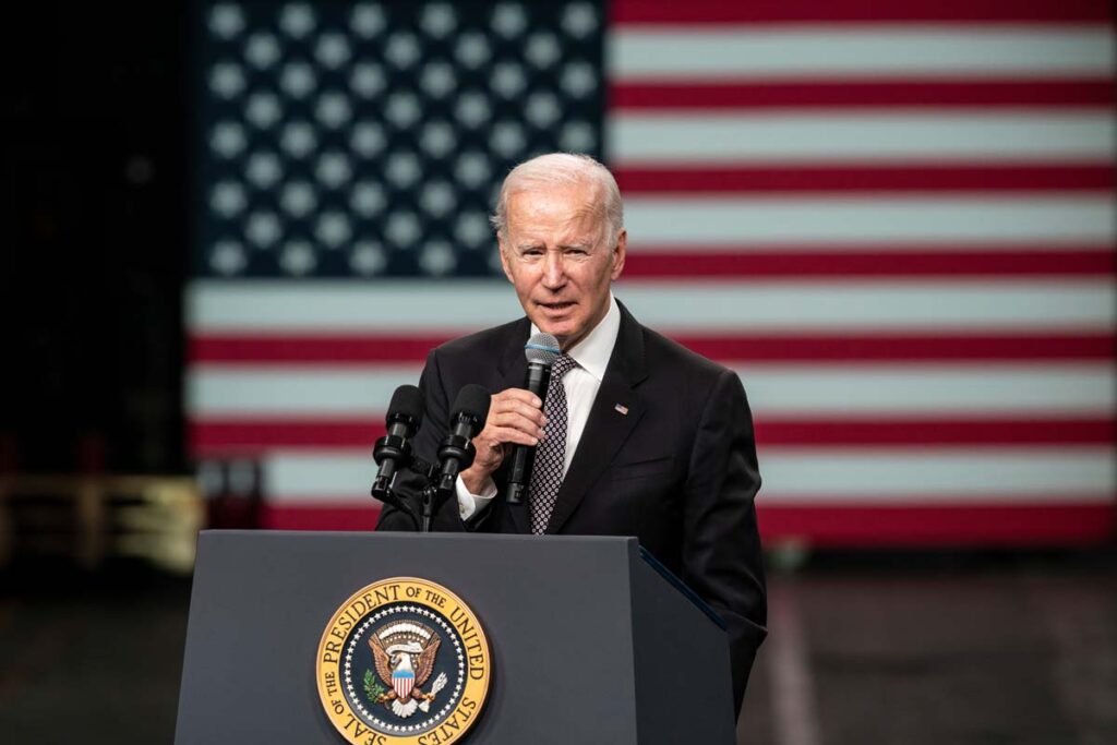 Photo of Joe Biden speaking at an event, representing the separated migrant families.