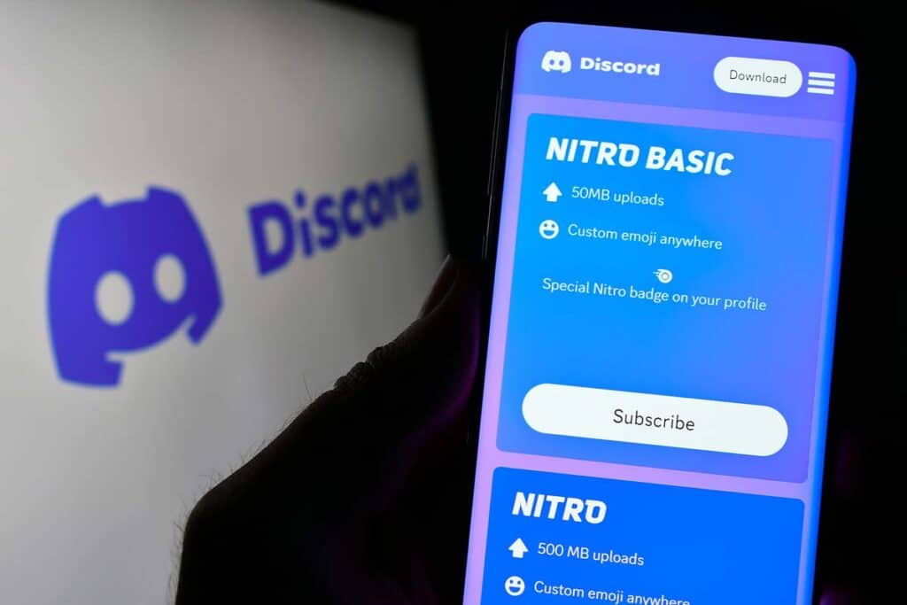 Close up of the Discord Nitro sign up page displayed on a smartphone screen, representing the Discord auto renewal class action.