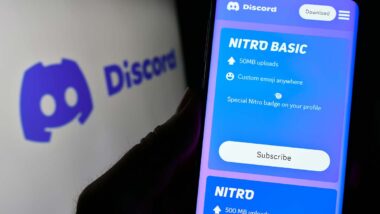Close up of the Discord Nitro sign up page displayed on a smartphone screen, representing the Discord auto renewal class action.