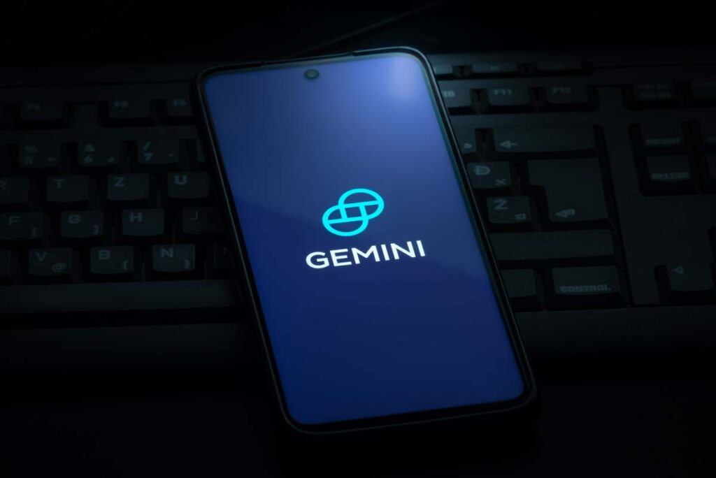 Close up of Gemini logo displayed on a smartphone screen, representing the Gemini crypto fraud lawsuit.