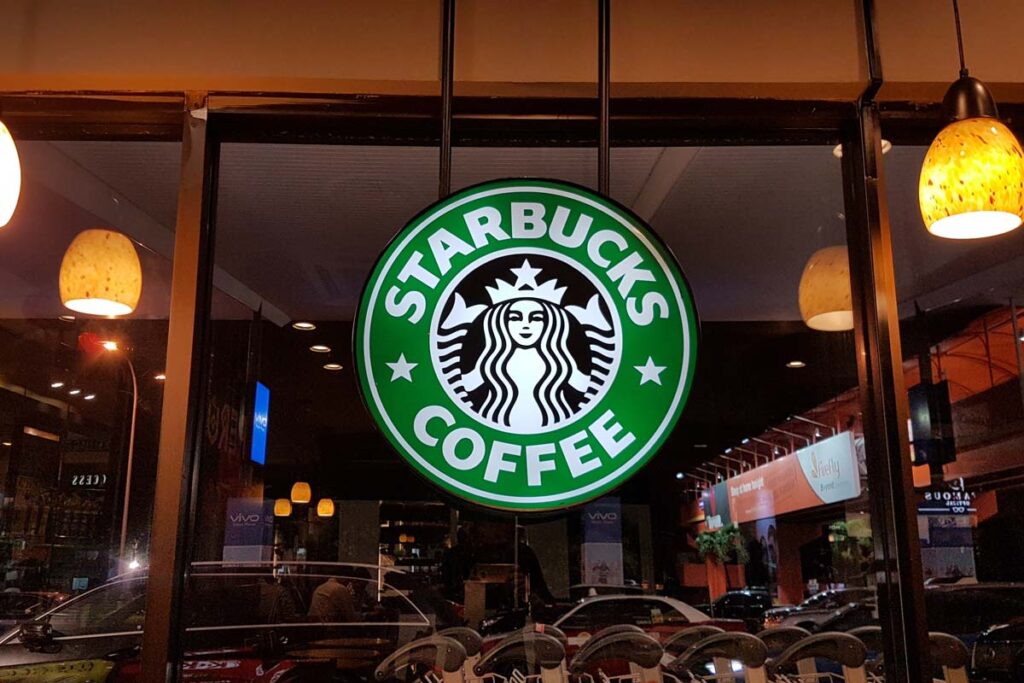 Close up of Starbucks Coffee signage, representing the Starbucks union lawsuit.