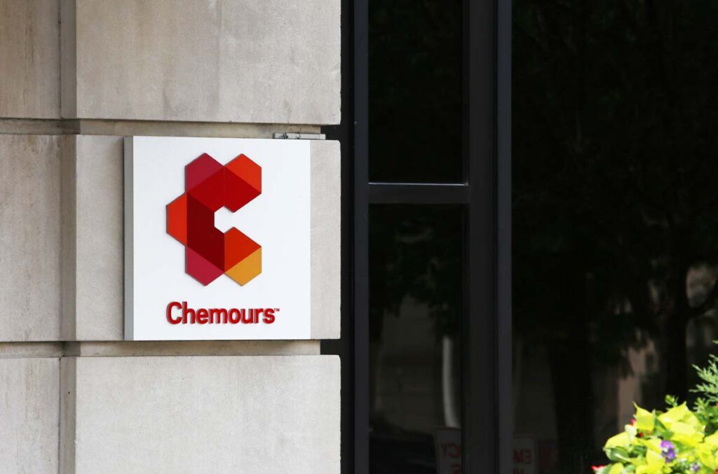 Close up of Chemours signage at an entrance, representing the Chemours and DuPont forever chemicals class action.