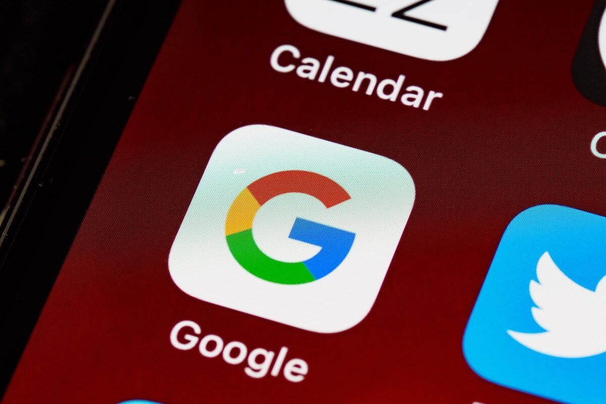 Close up of Google app displayed on smartphone home screen, representing the Android and Google Play Store antitrust litigation.