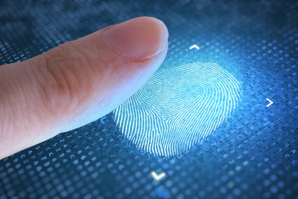 Close up of a finger resting on top of a digital fingerprint, representing the Biometric Impressions Corp. BIPA class action lawsuit settlement.