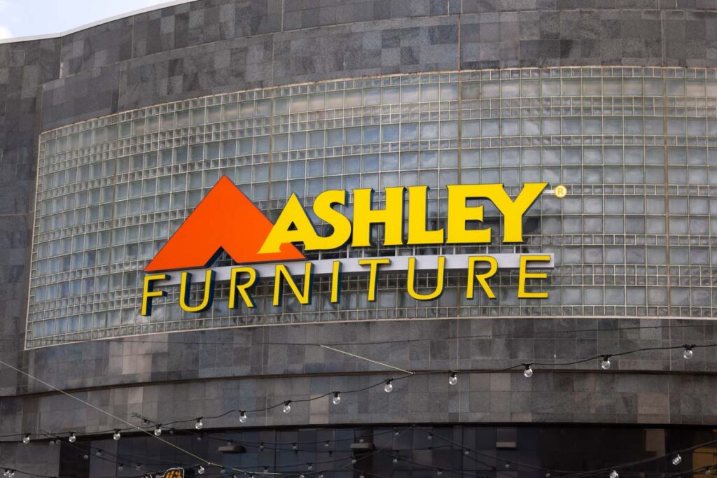 Close up of Ashley Furniture signage, representing the Ashley Furniture class action lawsuit settlement.